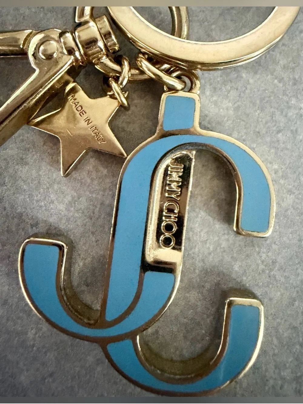 Jimmy Choo Enamel JC Star Logo Bag Charm Keychain in Gold-Tone and Light Blue